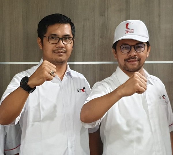 Anggota Komisi III DPR-RI Marinus Gea (kanan) bersama Penasihat Hukumnya Wiradarma Harefa (kiri)/foto:istimewa